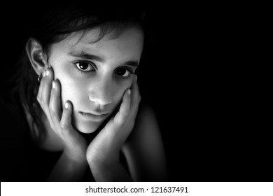 Portrait Of A Sad Hispanic Girl In Black And White With Space For Text