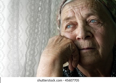 Portrait Of Sad Lonely Pensive Old Senior Woman