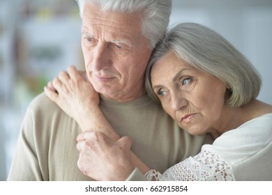 Portrait Of Sad Senior Couple