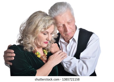 Portrait Of Sad Senior Couple Hugging Isolated