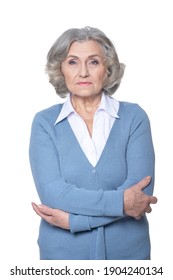 Portrait of sad senior woman posing isolated on white background