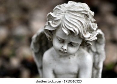 Portrait of a sad stone angel
