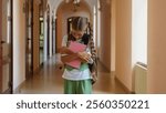 Portrait sad teen girl student pupil learner schoolgirl upset lonely child kid school college academy hall looking at camera frustrated alone worried fail exam studying learning problem bad education