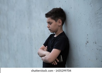 Portrait of a sad teenage boy looking thoughtful about troubles. Pensive teen. Depression, teen depression, pain, suffering - Powered by Shutterstock