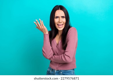 Portrait of sad upset angry woman with straight hairdo dressed pastel clothes protesting isolated on shine turquoise color background - Shutterstock ID 2279576871