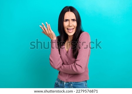 Portrait of sad upset angry woman with straight hairdo dressed pastel clothes protesting isolated on shine turquoise color background