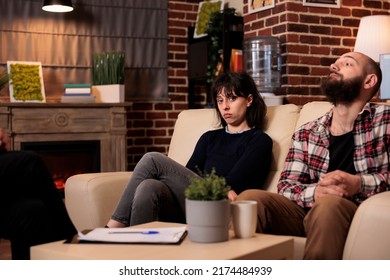 Portrait Of Sad Woman Attending Couple Therapy Session With Husband And Psychologist To Solve Marriage Difficulties. Receiving Professional Advice And Counseling To Help With Relationship Fight.