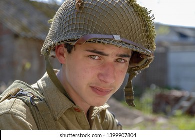 a portrait of sad young WWII american soldier