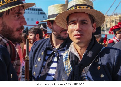 Portrait Of A Sailor Of The 18th Century Royal Navy In The Crowd. Reenactors Wearing A Vintage British Uniform Of A British Crew Of The 1800s. Málaga, Spain - October 26, 2014.