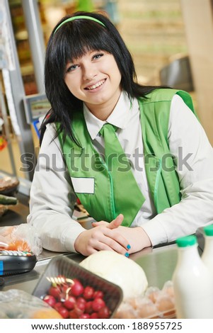 Portrait of Sales assistant or cashdesk worker in supermarket store