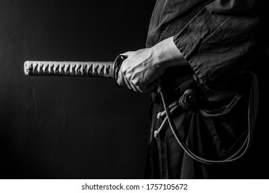 Portrait Of Samurai Holding Japanese Sword