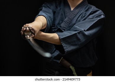 Portrait of samurai who holding Japanese sword
