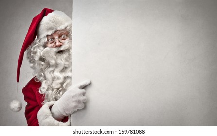 portrait of Santa Claus showing billboard - Powered by Shutterstock