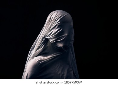 Portrait of a scary ghost isolated on black background - Shutterstock ID 1859759374