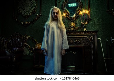 A Portrait Of A Scary Pale Girl From A Horror Film In A Room. Zombie, Halloween.