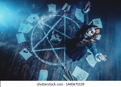 A portrait of a scary witch in the wooden house. Magic, dark force, spell.  - Shutterstock ID 1440670139