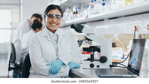 Portrait, science and happy woman on laptop in lab to research chemistry, test or innovation. Microscope, scientist and face of medical doctor in goggles for microbiology, healthcare or pharma study