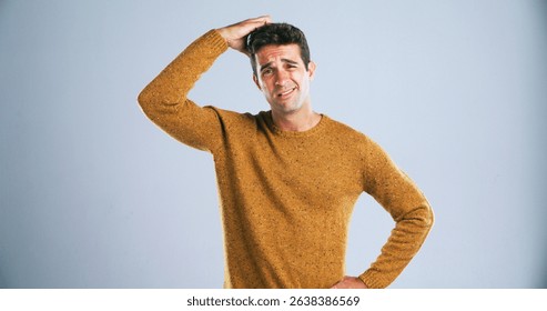 Portrait, scratching head and solution with man in studio for doubt, problem solving or question. Confused. emoji and why with unsure person on white background for answer, decision or mistake