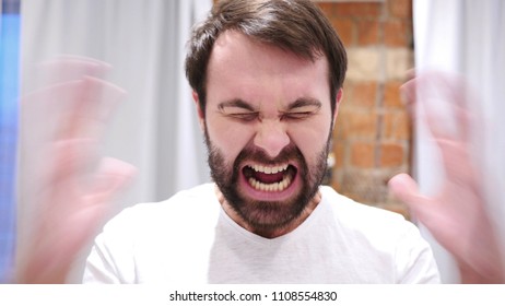 Portrait Of Screaming Beard Man Going Crazy, Indoor