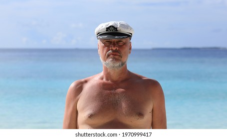 Portrait Of A Sea Captain On The Shore Of A Tropical Island