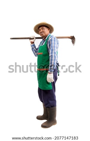 Portrait of senior agricultural worker posing with a hoe isolated on white background, clipping path