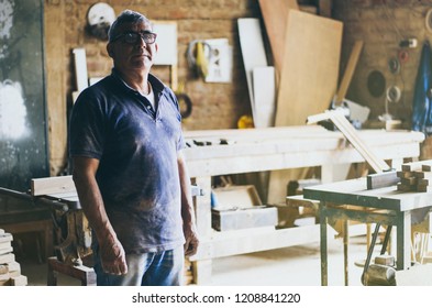 Portrait of senior carpenter in his workshop