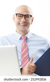 Portrait Of Senior Chief Financier Officer Sitting In Front Of Computer And Analyzing Data. Business People. 