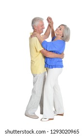 Portrait Of Senior Couple Dancing On White Background