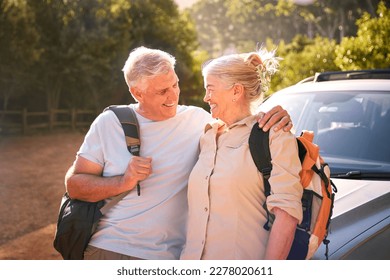 Portrait Of Senior Couple Going For Hike In Countryside Standing By Car Together - Powered by Shutterstock