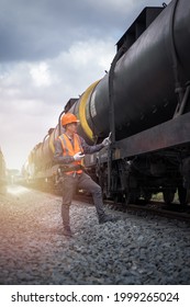 Portrait Senior Engineer With Freight Oil Train. Senior Engineer Worker.