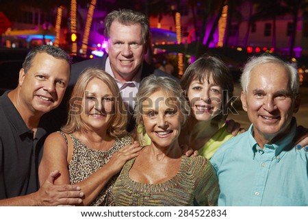 Portrait Of Senior Friends On Evening Out Together