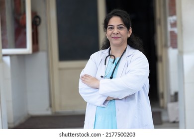 Portrait Of Senior Indian Female Doctor In Hospital