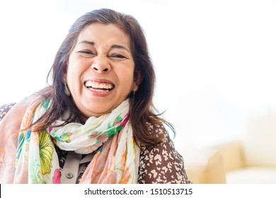 Portrait Of Senior Indian Woman Laughing And Smiling In Hospital Waiting Doctor.Senior Adult Women Smiling Happy Concept