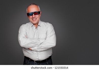 Portrait Of Senior Man With 3d Glasses Standing Near Empty Copyspace