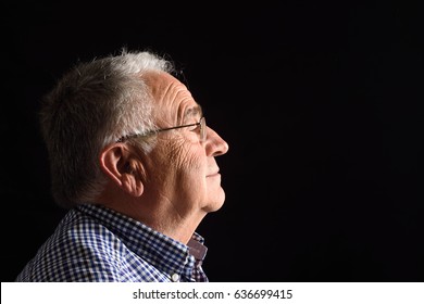 Portrait Of A Senior Man With Black Background