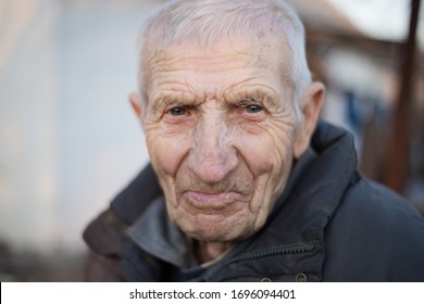 Portrait Of Senior Man Close Up Outdoor
