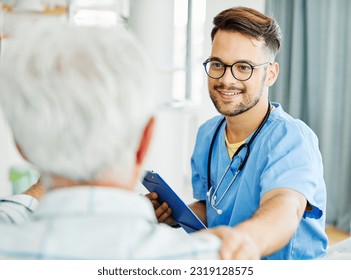 Portrait  of a senior man with doctor or nurse caregiver at home or nursing home - Powered by Shutterstock