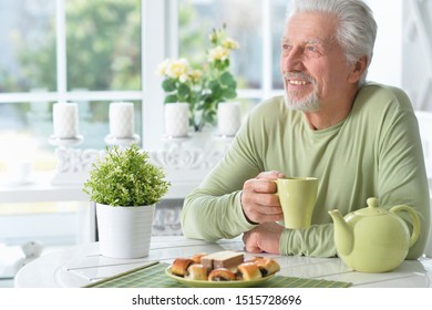 Portrait Of Senior Man Drinking Tea At Home