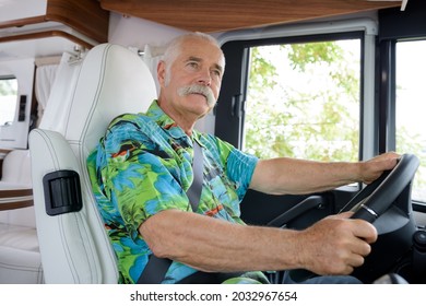 Portrait Of Senior Man Driving A Van