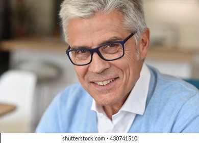 Portrait of senior man with eyeglasses