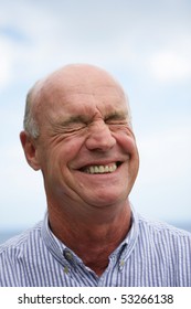 Portrait Of A Senior Man Laughing