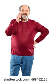 Portrait Of Senior Man Making A Phone Call With Hand On Hip Against White Background