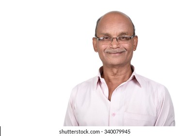 Portrait Of A Senior Man Smiling Against White Background. A Senior Indian / Asian Man - Isolated On White
