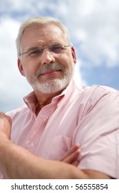 Portrait of a senior man smiling with eyeglasses