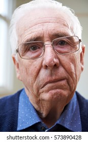 Portrait Of Senior Man Suffering From Stroke