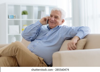 Portrait Of A Senior Man Talking On The Phone