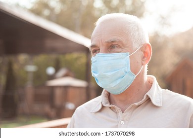 Portrait of senior man wearing medical mask. coronavirus concept. respiratory protection - Powered by Shutterstock