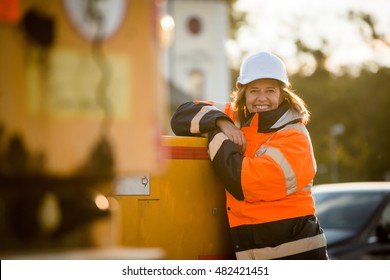 Portrait of senior woman engineer wearing protective workwear - outdoor