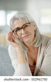 Portrait of senior woman with eyeglasses - Shutterstock ID 552961750