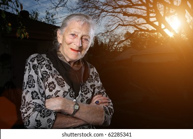 Portrait of a senior woman outdoors, smiling